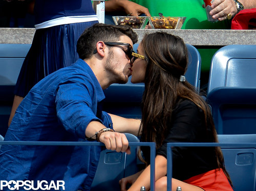 Nick Jonas gave his girlfriend a kiss in the stands.
Nick Jonas gave his girlfriend a kiss in the stands.