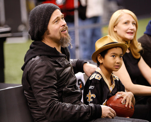 Brad Pitt and his son Maddox Jolie-Pitt took a seat on the bench before New Orleans Saints playoff game in January 2010.
Brad Pitt and his son Maddox Jolie-Pitt took a seat on the bench before New Orleans Saints playoff game in January 2010.