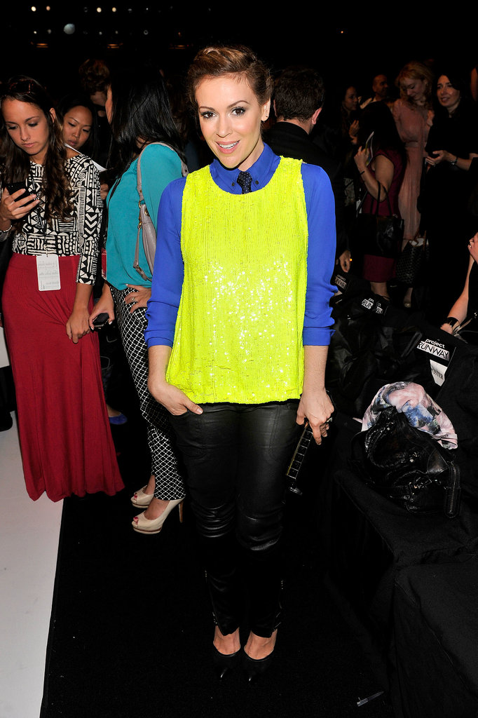 Alyssa Milano layered a neon yellow sequined top over a blue blouse, then finished with black leather pants and a polka-dot tie at the Project Runway show.
Alyssa Milano layered a neon yellow sequined top over a blue blouse, then finished with black leather pants and a polka-dot tie at the Project Runway show.