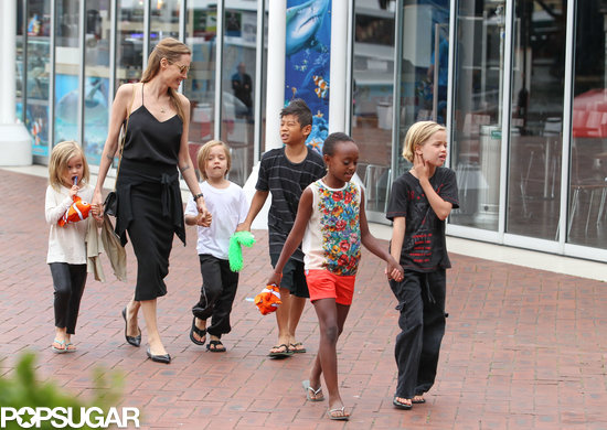Angelina Jolie and her kida held hands as they walked through Sydney's Darling Harbour.
Angelina Jolie and her kida held hands as they walked through Sydney's Darling Harbour.
