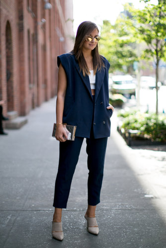 A boxy menswear jacket was made for layering over a crop top.
A boxy menswear jacket was made for layering over a crop top.