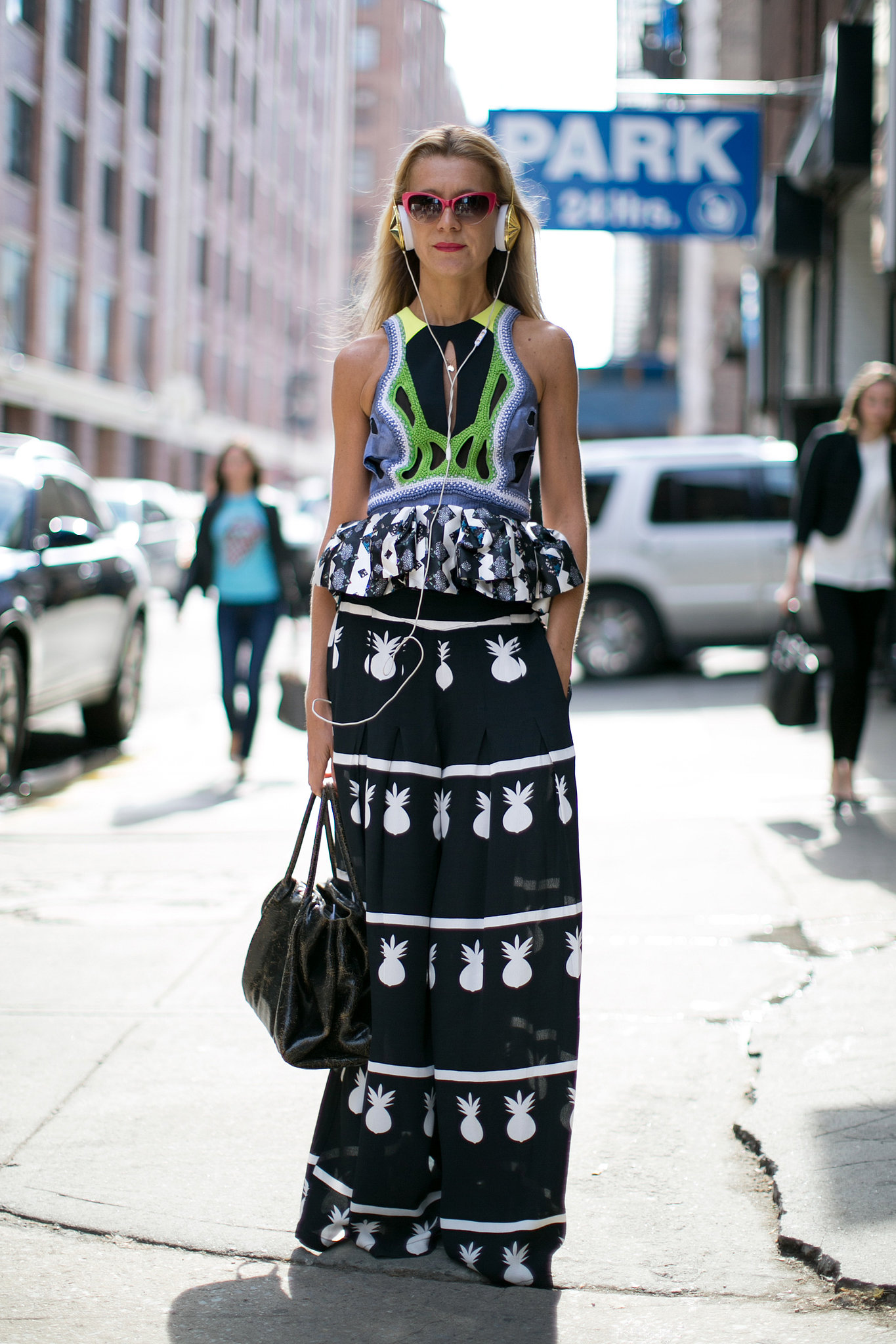 Natalie Joos ruled the sidewalk in her major prints and Morgenthal Frederics shades. 
