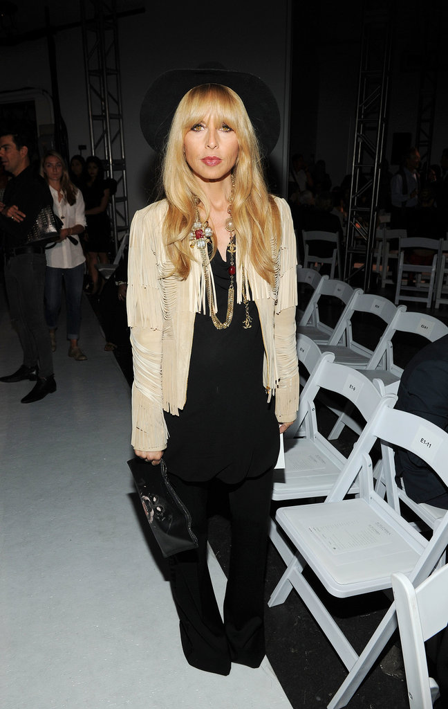 Rachel Zoe was in the bohemian spirit at Altuzarra. She matched a black jumpsuit with a black wide-brim hat, then threw on a suede fringe jacket and a Chanel necklace to finish.
Rachel Zoe was in the bohemian spirit at Altuzarra. She matched a black jumpsuit with a black wide-brim hat, then threw on a suede fringe jacket and a Chanel necklace to finish.