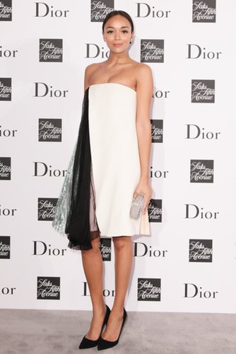 At the same party, Ashley Madekwe chose a white and pink strapless dress with black pumps, both by Dior.
At the same party, Ashley Madekwe chose a white and pink strapless dress with black pumps, both by Dior.
