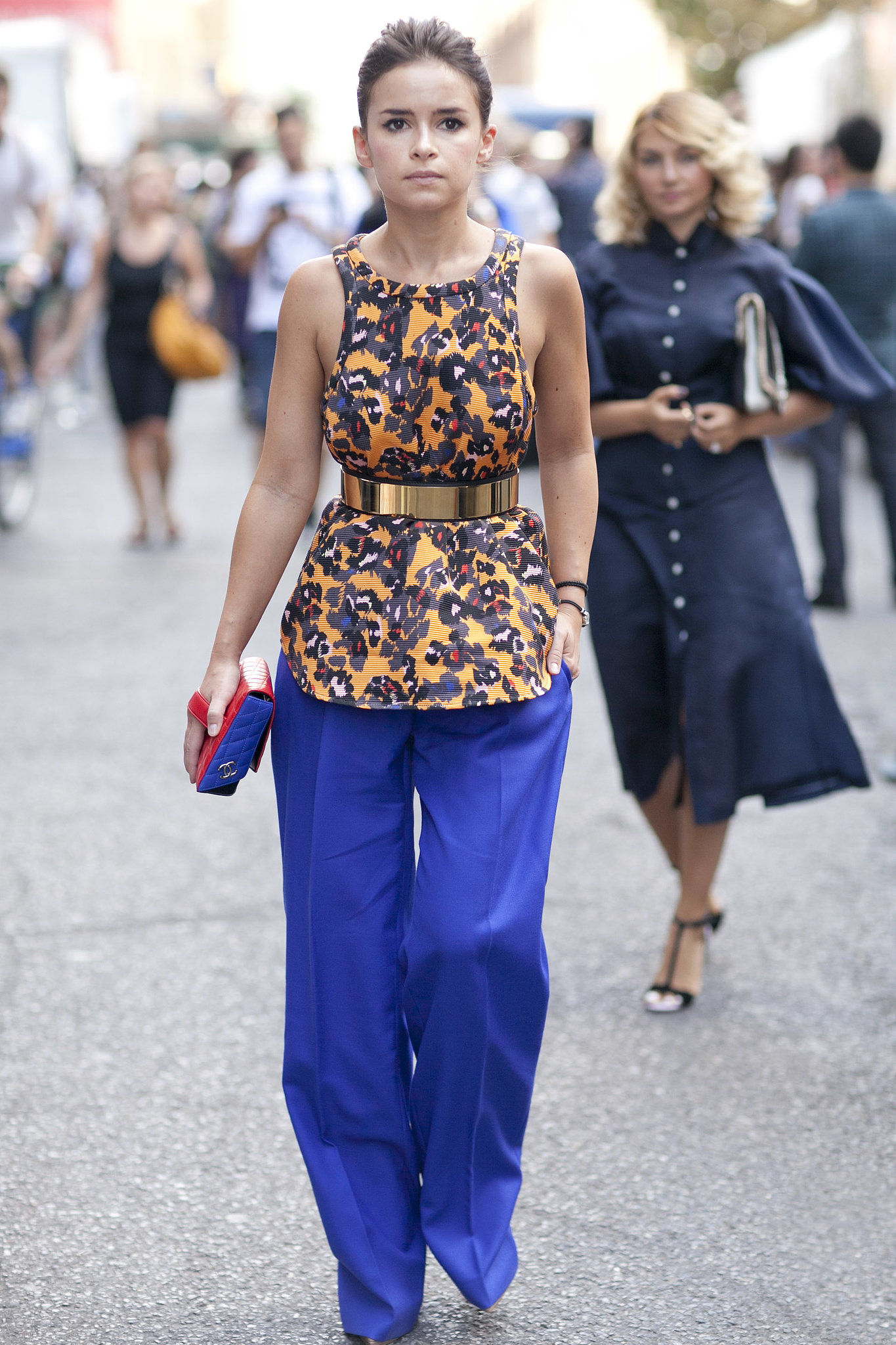 Miroslava went bold in a printed blouse, wide-leg pants, and a colorblock Chanel in hand. 

