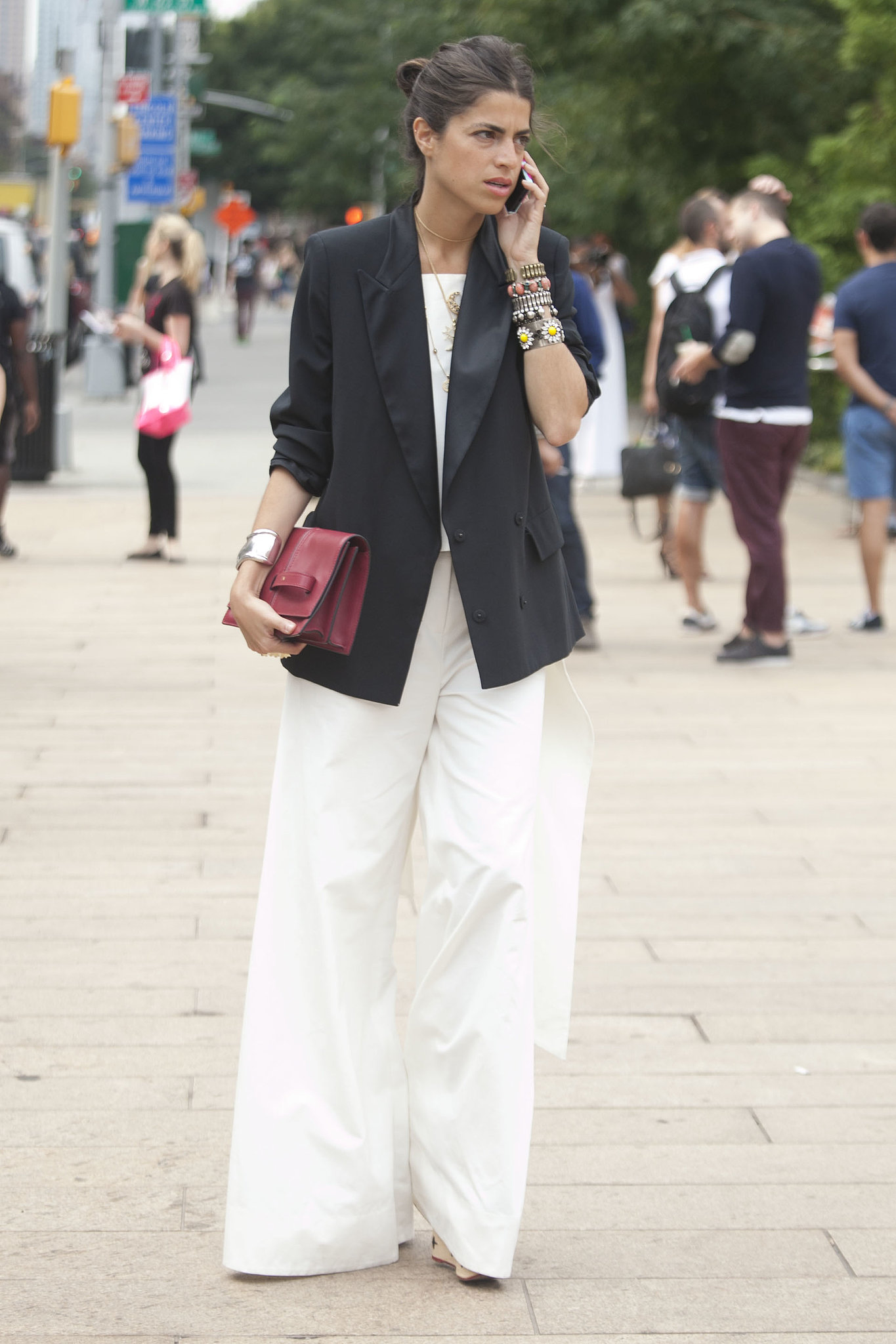 Leandra Medine showed off an armful of jewels and an elegant white and black look. 
