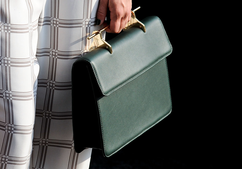 Unique top handle meets classic handbag for a truly covetable design.
Unique top handle meets classic handbag for a truly covetable design.