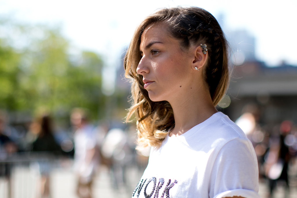 Her earrings are worth a closer look.
Her earrings are worth a closer look.