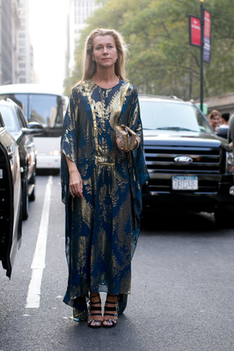 Natalie Joos dressed for the NYC heat wave in a gilded caftan.
Natalie Joos dressed for the NYC heat wave in a gilded caftan.