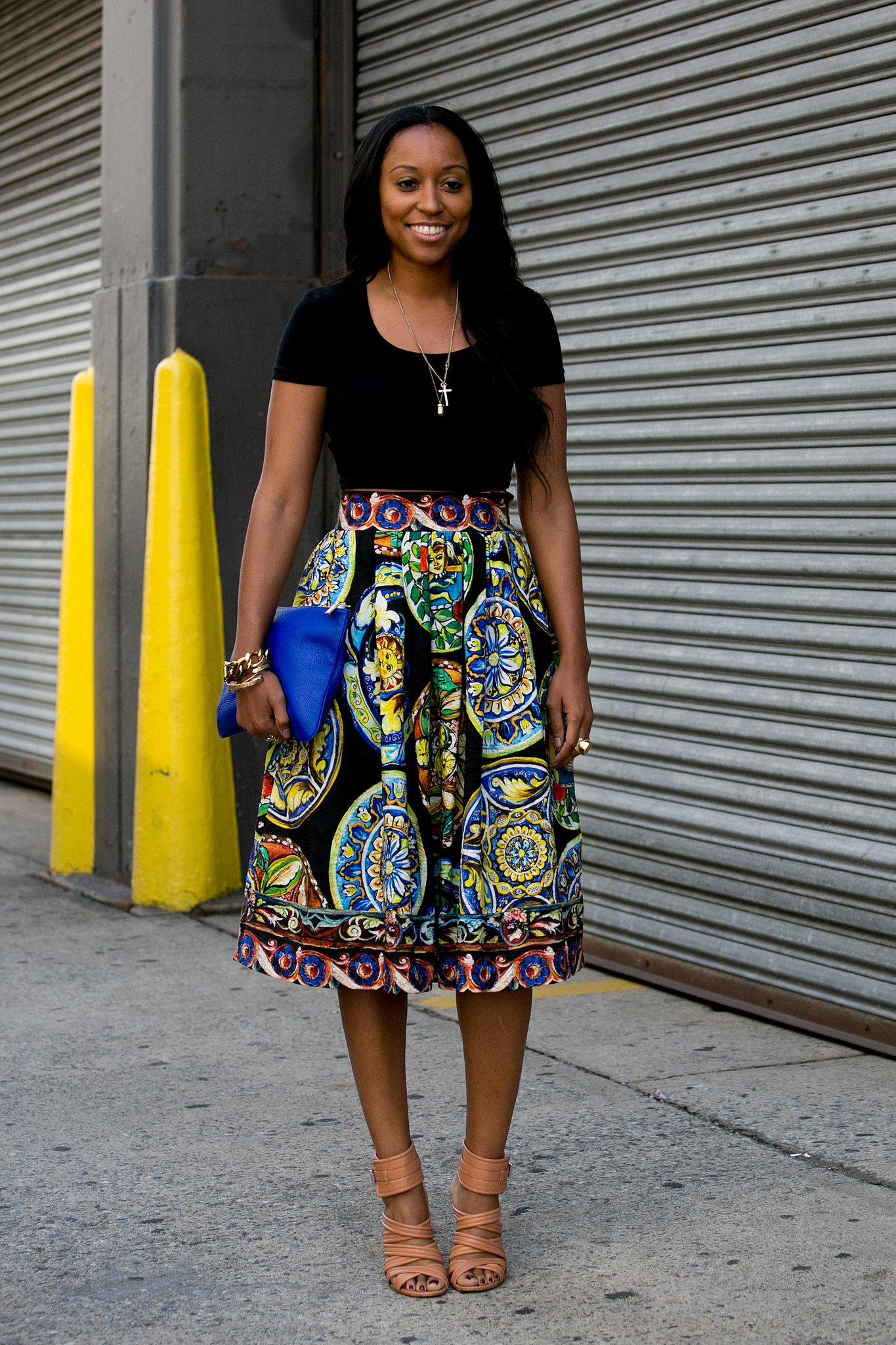 Shiona Turini pared down a bold full skirt with a t-shirt and strappy heels. 
