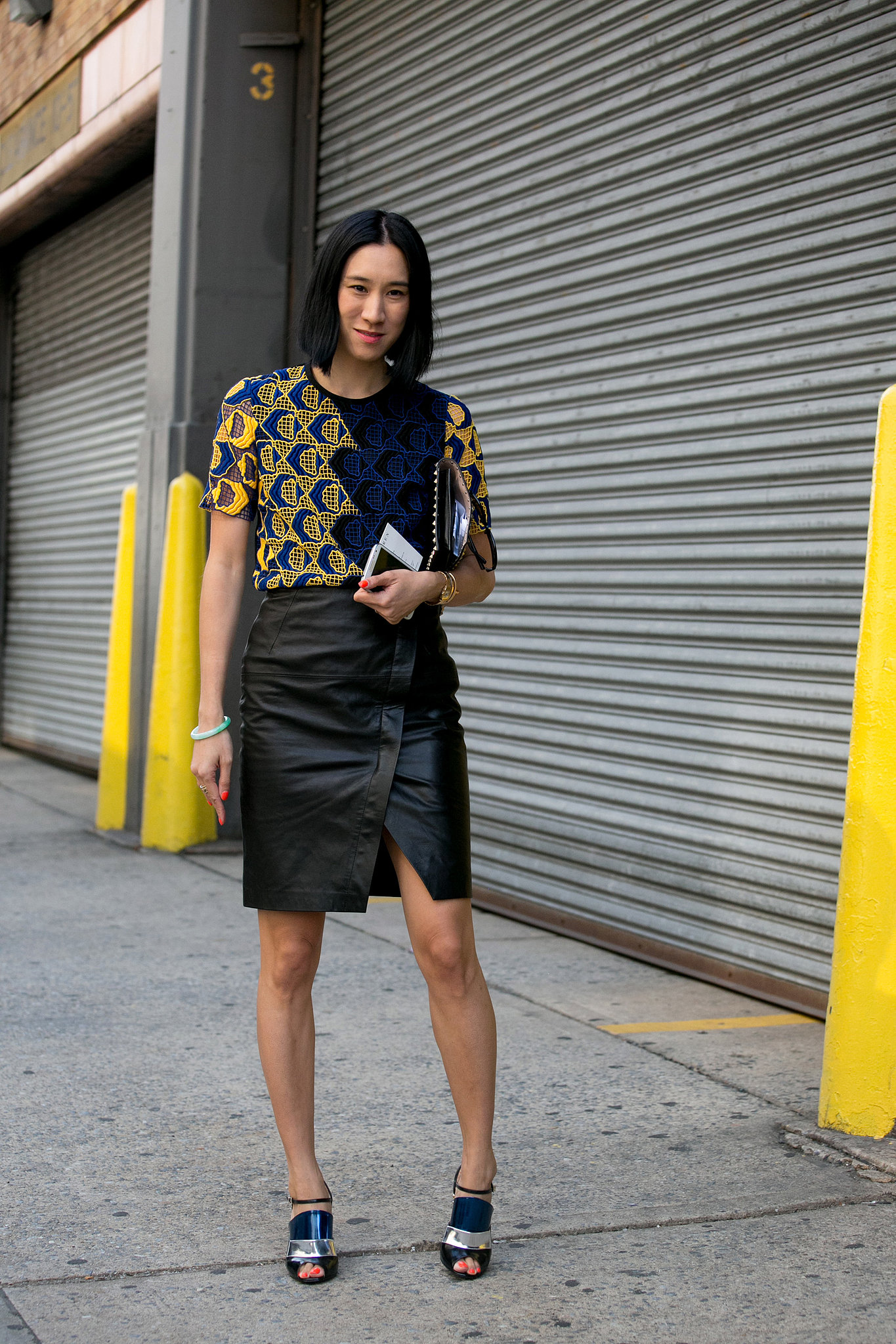 Eva Chen worked a little leather skirt and a statement printed top.
