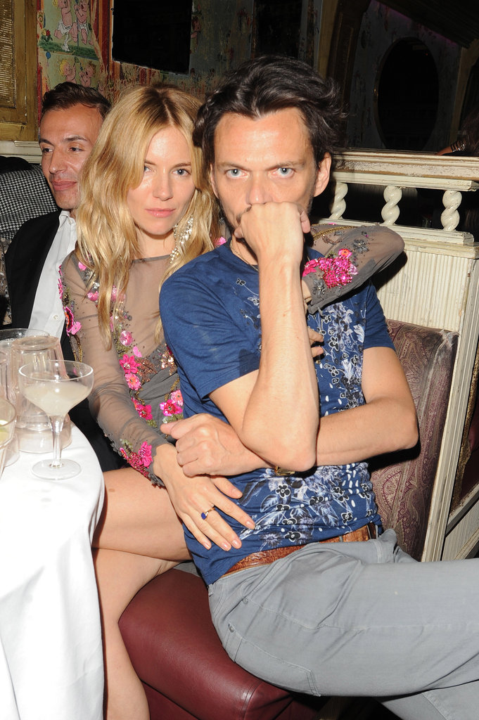 Sienna Miller and Matthew Williamson sat tight at the designer's Fashion Week afterparty.
Sienna Miller and Matthew Williamson sat tight at the designer's Fashion Week afterparty.