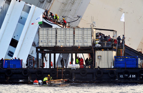 Engineers worked to right the vessel so that it could be towed away and scrapped.
Engineers worked to right the vessel so that it could be towed away and scrapped.