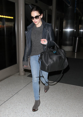 Emilia Clarke kept her style palette dark at LAX. She paired a gray sweater with a leather biker jacket, skinny denim, and cap-toe booties.
Emilia Clarke kept her style palette dark at LAX. She paired a gray sweater with a leather biker jacket, skinny denim, and cap-toe booties.