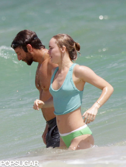 Bradley Cooper and Suki Waterhouse hit the beach during their Hawaii vacation.
Bradley Cooper and Suki Waterhouse hit the beach during their Hawaii vacation.