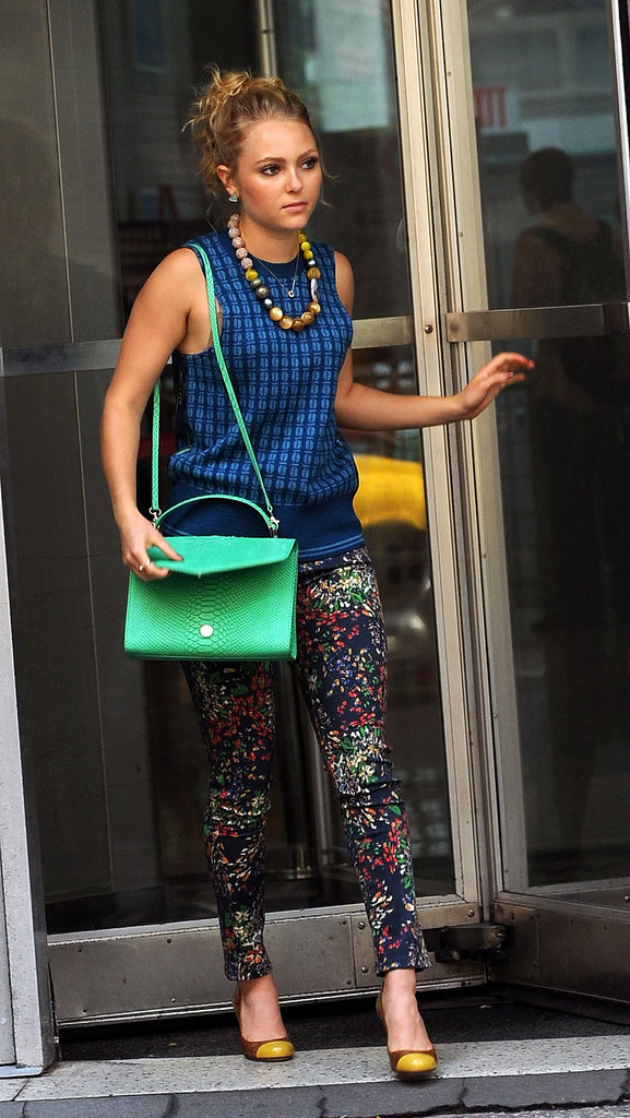 Carrie was all business, donning a blue Tory Burch sweater ($195, originally $325), cropped at the sleeves, with garden-print Alice + Olivia denim ($170, originally $199) and cap-toe Kate Spade pumps.
Carrie was all business, donning a blue Tory Burch sweater ($195, originally $325), cropped at the sleeves, with garden-print Alice + Olivia denim ($170, originally $199) and cap-toe Kate Spade pumps.