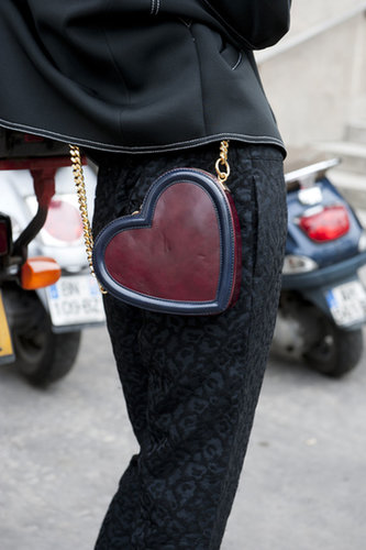 Wearing her heart on her sleeve purse.
Wearing her heart on her sleeve purse.