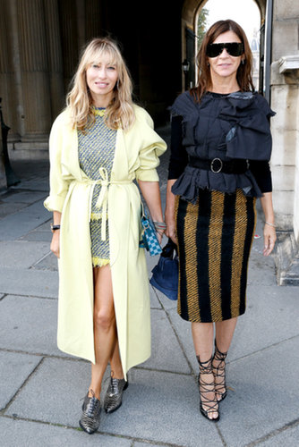 Alexandra Golovanoff and Carine Roitfeld walked up to the Louis Vuitton runway in high-contrast designs.
Alexandra Golovanoff and Carine Roitfeld walked up to the Louis Vuitton runway in high-contrast designs.