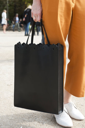 A little laser-cut leather gives a basic tote a unique upgrade.
A little laser-cut leather gives a basic tote a unique upgrade.
