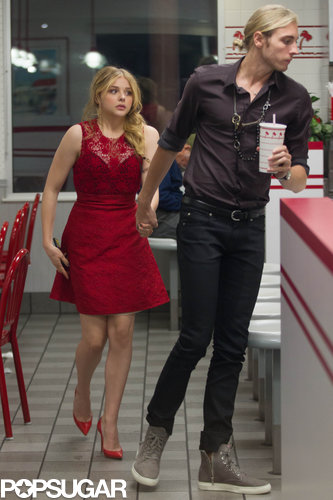 Chloë Moretz stopped at In-N-Out Burger with a group of friends.
Chloë Moretz stopped at In-N-Out Burger with a group of friends.