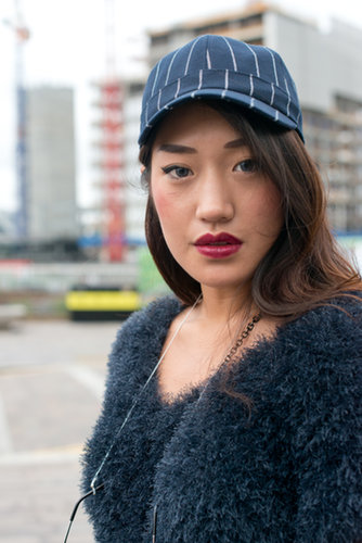 Keep things glossy by opting for a sleek blowout under your baseball cap.
Keep things glossy by opting for a sleek blowout under your baseball cap.