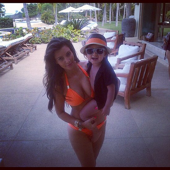 Kim Kardashian wore an orange two-piece while holding on to her nephew, Mason Disick, while vacationing in Mexico in May 2012.
Source: Instagram user kimkardashian
Kim Kardashian wore an orange two-piece while holding on to her nephew, Mason Disick, while vacationing in Mexico in May 2012.
Source: Instagram user kimkardashian