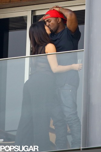 Kim Kardashian kissed Kanye West.
Kim Kardashian kissed Kanye West.
