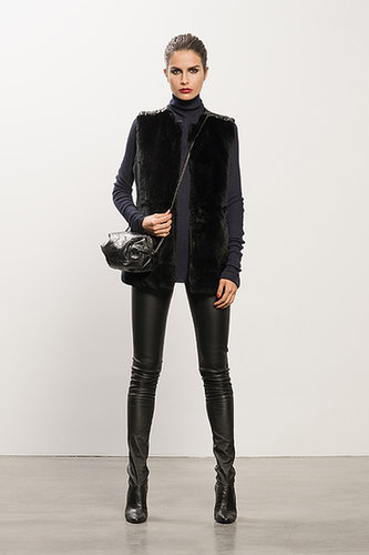 Rabbit Fur Black Vest ($995), Cashmere Navy Turtleneck Sweater ($495), Sweet Revenge Black Leather Legging Boot ($1,995), Sunset Watersnake Black Cross Body Bag ($625)
Photo courtesy of Tamara Mellon
Rabbit Fur Black Vest ($995), Cashmere Navy Turtleneck Sweater ($495), Sweet Revenge Black Leather Legging Boot ($1,995), Sunset Watersnake Black Cross Body Bag ($625)
Photo courtesy of Tamara Mellon