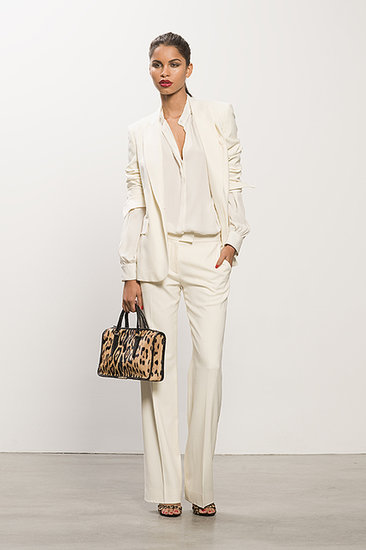 Classic Cream Wool Pique Blazer ($795), Classic Cream Wool Pique Trouser ($595), Georgette Cream Long Sleeve Blouse ($350), Wild Night Leopard Pony Sandal ($750), Diglam Leopard Pony Satchel ($1,195)
Photo courtesy of Tamara Mellon
Classic Cream Wool Pique Blazer ($795), Classic Cream Wool Pique Trouser ($595), Georgette Cream Long Sleeve Blouse ($350), Wild Night Leopard Pony Sandal ($750), Diglam Leopard Pony Satchel ($1,195)
Photo courtesy of Tamara Mellon