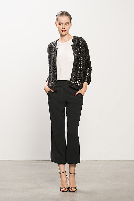 Sequin Black Cardigan ($750), Cashmere Cream Tee ($295), Crepe Black Elastic Bottom Pant ($595), Wild Night Leopard Pony Sandal ($750)
Photo courtesy of Tamara Mellon
Sequin Black Cardigan ($750), Cashmere Cream Tee ($295), Crepe Black Elastic Bottom Pant ($595), Wild Night Leopard Pony Sandal ($750)
Photo courtesy of Tamara Mellon