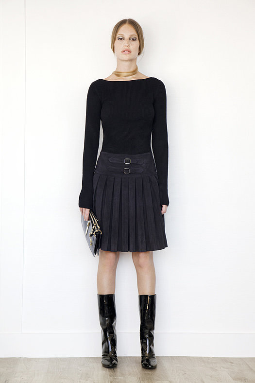 Knit Boatneck Top With Pleated Skirt Combo Dress in Black ($895), Follow Me Patent Mid-Calf Boot in Black ($995), Attraction Patent Shoulder Bag in Black ($1,795)
Photo courtesy of Tamara Mellon
Knit Boatneck Top With Pleated Skirt Combo Dress in Black ($895), Follow Me Patent Mid-Calf Boot in Black ($995), Attraction Patent Shoulder Bag in Black ($1,795)
Photo courtesy of Tamara Mellon