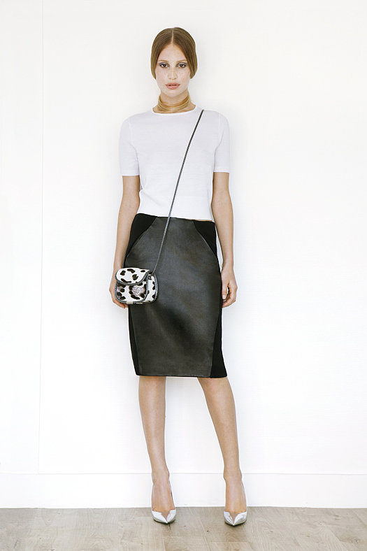 Short Sleeved Cashmere Tee in Cream ($295), Leather Slim Skirt in Black ($1,195), Treasure Cross Body Pony Bag in Cream Leopard ($795), Addiction Pump in Specchio ($595)
Photo courtesy of Tamara Mellon
Short Sleeved Cashmere Tee in Cream ($295), Leather Slim Skirt in Black ($1,195), Treasure Cross Body Pony Bag in Cream Leopard ($795), Addiction Pump in Specchio ($595)
Photo courtesy of Tamara Mellon