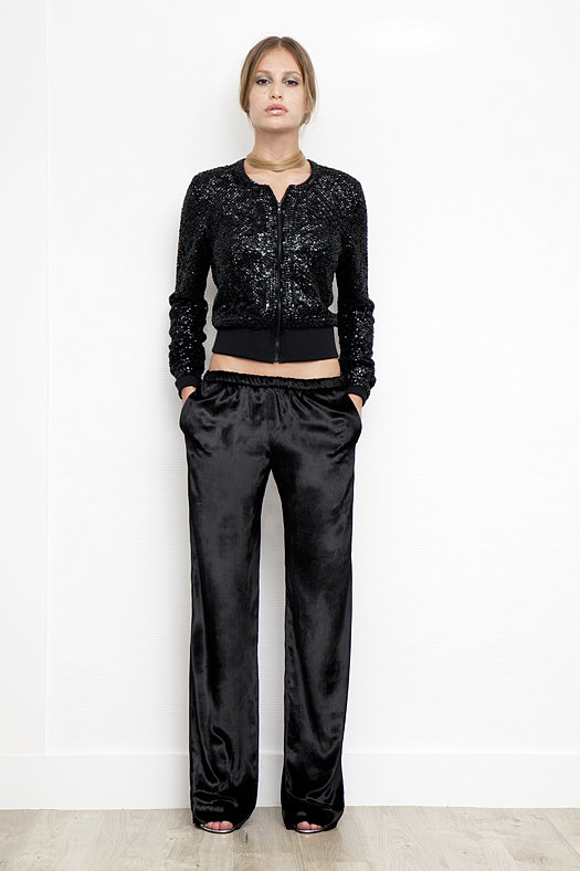 Sequin Zip-Front Merino Cardigan in Black ($850), Velvet Track Pant in Black ($595), Whisper Sandal in Specchio ($650)
Photo courtesy of Tamara Mellon
Sequin Zip-Front Merino Cardigan in Black ($850), Velvet Track Pant in Black ($595), Whisper Sandal in Specchio ($650)
Photo courtesy of Tamara Mellon