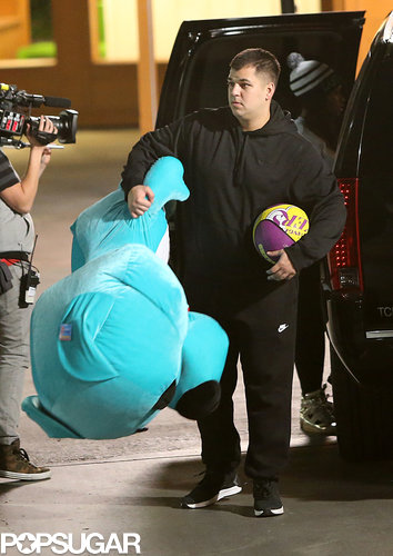 Rob Kardashian carried a huge stuffed animal.
Rob Kardashian carried a huge stuffed animal.