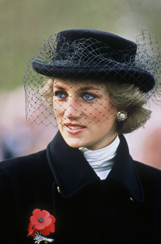 We spy a swipe of blue eyeliner hiding behind Diana's veil.
We spy a swipe of blue eyeliner hiding behind Diana's veil.