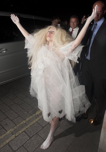 If there is a theatrical way to arrive to a hotel, Lady Gaga will find it. Here she is in a diaphanous layered white dress at a hotel in London.
If there is a theatrical way to arrive to a hotel, Lady Gaga will find it. Here she is in a diaphanous layered white dress at a hotel in London.