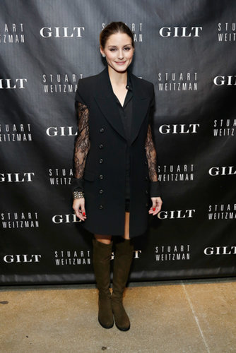 Olivia outfitted a chic sleeveless coat with knee-high Stuart Weitzman boots at the anniversary celebration for the 5050 Boot in October.
Olivia outfitted a chic sleeveless coat with knee-high Stuart Weitzman boots at the anniversary celebration for the 5050 Boot in October.