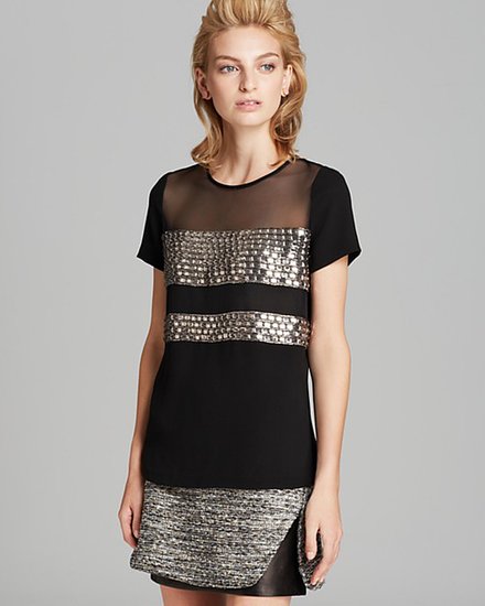 Worth the splurge, this Diane von Furstenberg Kayla Square Crystal Top ($398) would be just as appropriate for an elegant holiday affair tucked into a pencil skirt as it would be with ankle-crop jeans and metallic pumps.
Worth the splurge, this Diane von Furstenberg Kayla Square Crystal Top ($398) would be just as appropriate for an elegant holiday affair tucked into a pencil skirt as it would be with ankle-crop jeans and metallic pumps.