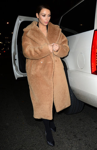 It doesn't get much cozier than Kim's teddy bear Max Mara topper!
It doesn't get much cozier than Kim's teddy bear Max Mara topper!