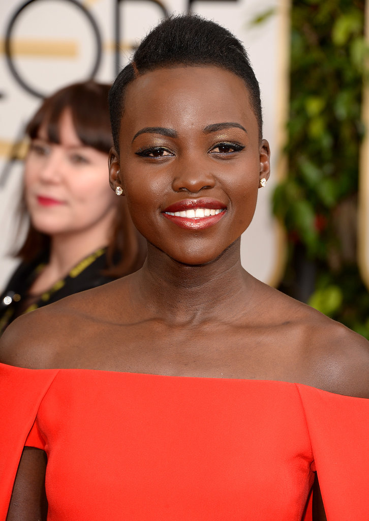 Lupita Nyong'o's gold eye shadow and high-shine lips radiated star power.
Lupita Nyong'o's gold eye shadow and high-shine lips radiated star power.