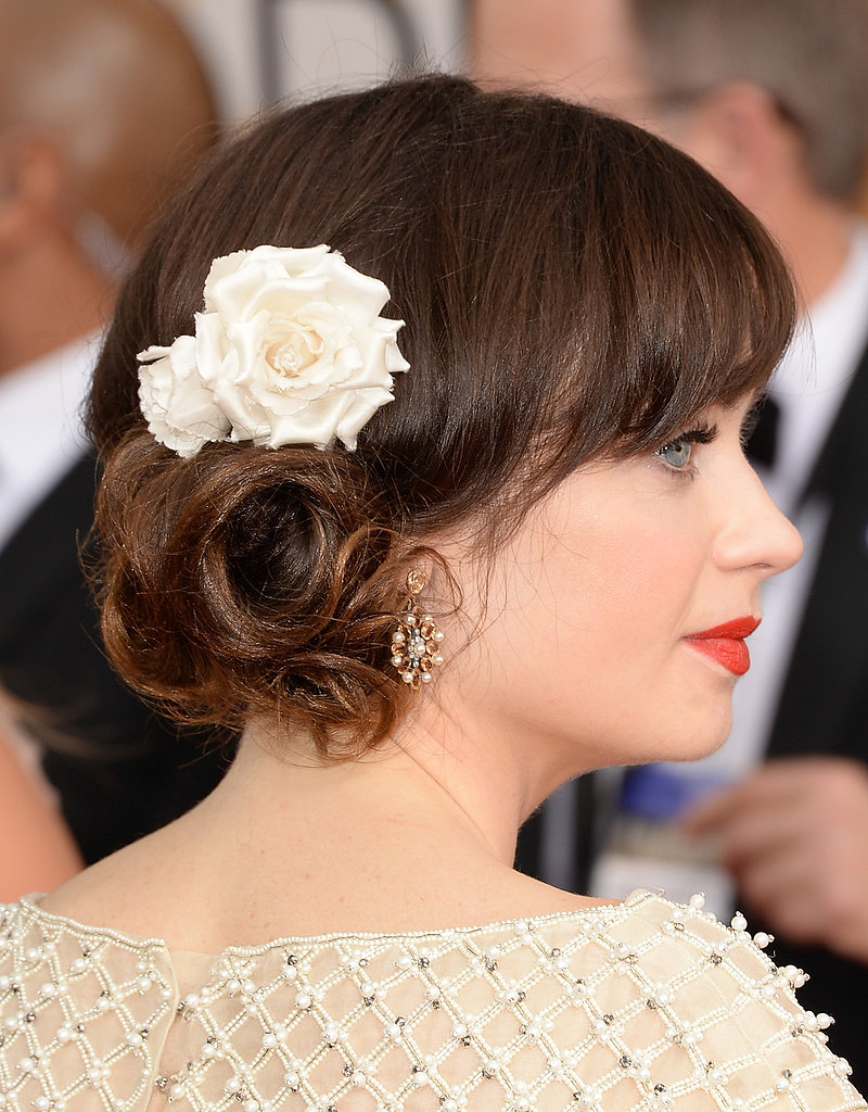 A perfect shot of Zooey's blooming custom Jennifer Behr hair piece.
A perfect shot of Zooey's blooming custom Jennifer Behr hair piece.
