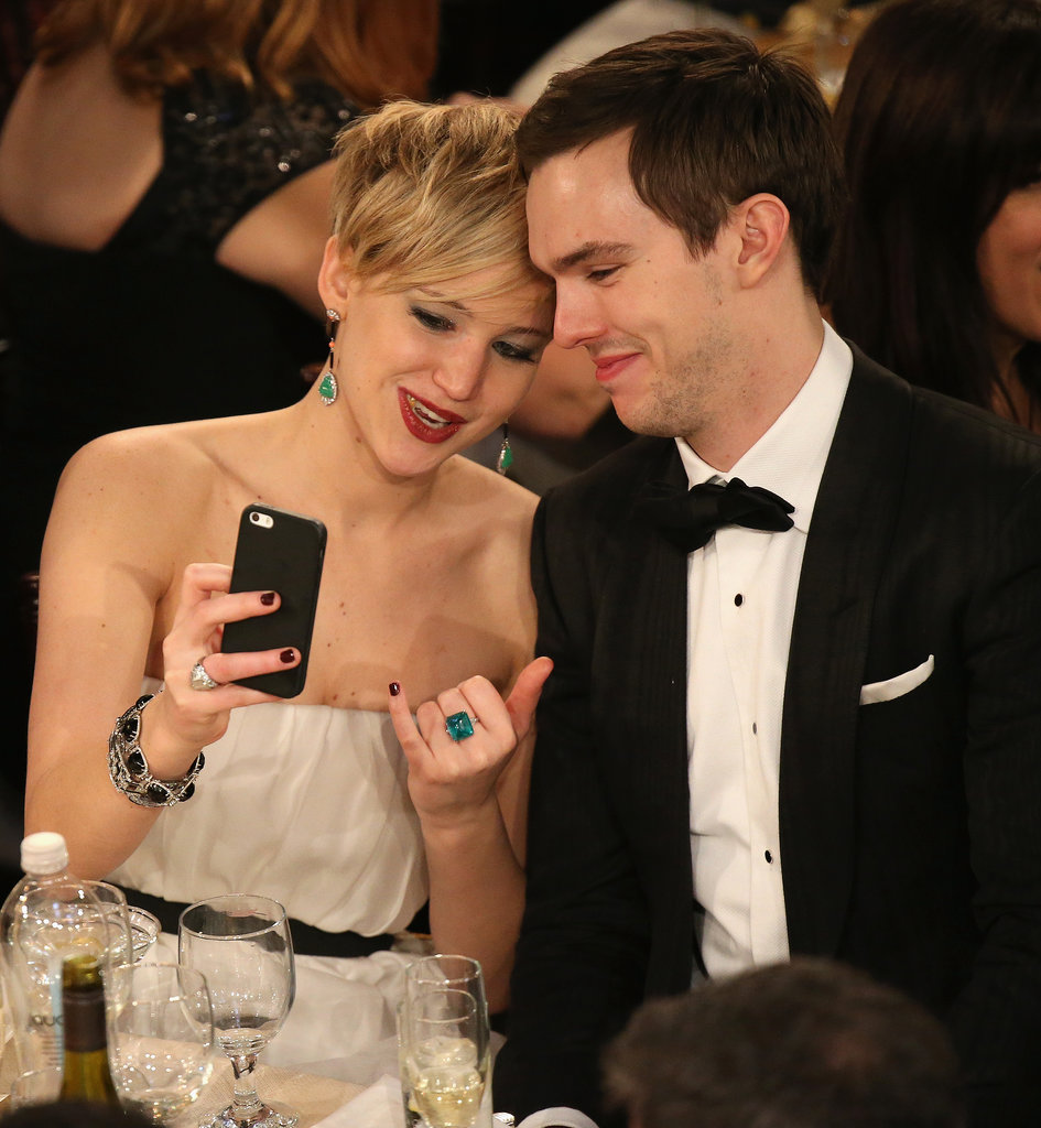 Jennifer Lawrence and Nicholas Hoult took a selfie at their table. 
Source: Christopher Polk/NBC/NBCU Photo Bank/NBC
