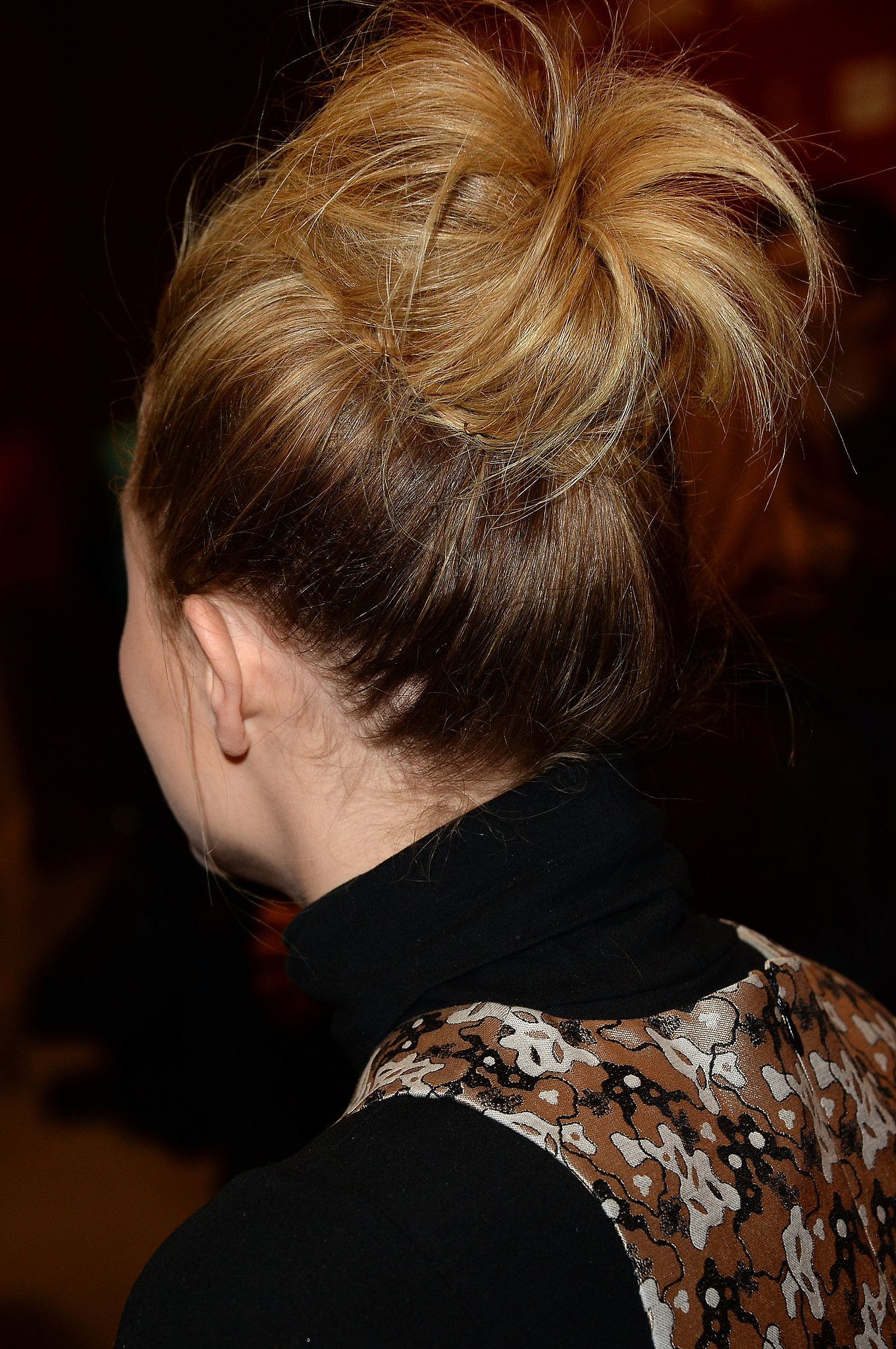 "For Chloë's look for the premiere, we wanted to do a textured, fashion-inspired topknot," said Urban. "I began by spraying her damp hair section by section with Leonor Greyl's Voluforme ($36) for volume and lift and then blew it dry with a large round brush. In one-inch sections, I backcombed all of her hair loosely and then gathered it into a high ponytail with my hands and secured with an elastic. I didn't want to brush the ponytail into place, because then I would lose the texture from the backcombing. I teased the pony, wrapped it into a bun, and secured with bobby pins and hair pins."
And the most important part? "I pulled the bun apart slightly and pulled out some wispy pieces around the hairline to give it a really loose, textured feel," the beauty pro explained. "To finish and set the look, I sprayed Chloë's hair with Leonor Greyl Spray Structure Naturelle ($38) for all-night hold."
Hear that girls? So put down your bun roller and use the texture that you've got to create a mega bun. Second-day hair encouraged.
"For Chloë's look for the premiere, we wanted to do a textured, fashion-inspired topknot," said Urban. "I began by spraying her damp hair section by section with Leonor Greyl's Voluforme ($36) for volume and lift and then blew it dry with a large round brush. In one-inch sections, I backcombed all of her hair loosely and then gathered it into a high ponytail with my hands and secured with an elastic. I didn't want to brush the ponytail into place, because then I would lose the texture from the backcombing. I teased the pony, wrapped it into a bun, and secured with bobby pins and hair pins."
And the most important part? "I pulled the bun apart slightly and pulled out some wispy pieces around the hairline to give it a really loose, textured feel," the beauty pro explained. "To finish and set the look, I sprayed Chloë's hair with Leonor Greyl Spray Structure Naturelle ($38) for all-night hold."
Hear that girls? So put down your bun roller and use the texture that you've got to create a mega bun. Second-day hair encouraged.
