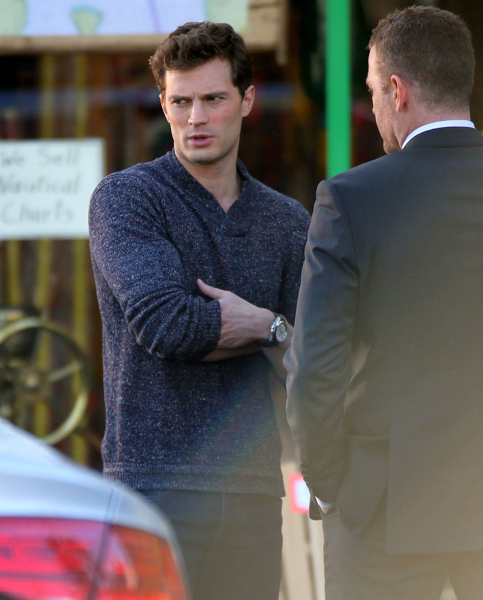 Dornan showed off Christian Grey's smoldering looks and thick arms.

