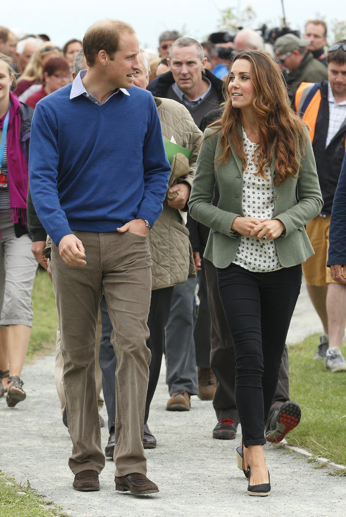 Kate and Will chatted in August 2013 while attending a marathon in Wales.
Kate and Will chatted in August 2013 while attending a marathon in Wales.