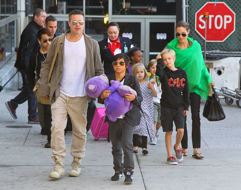 Angie and Brad Bring the Whole Family Back Home Angie and Brad Bring the Whole Family Back Home