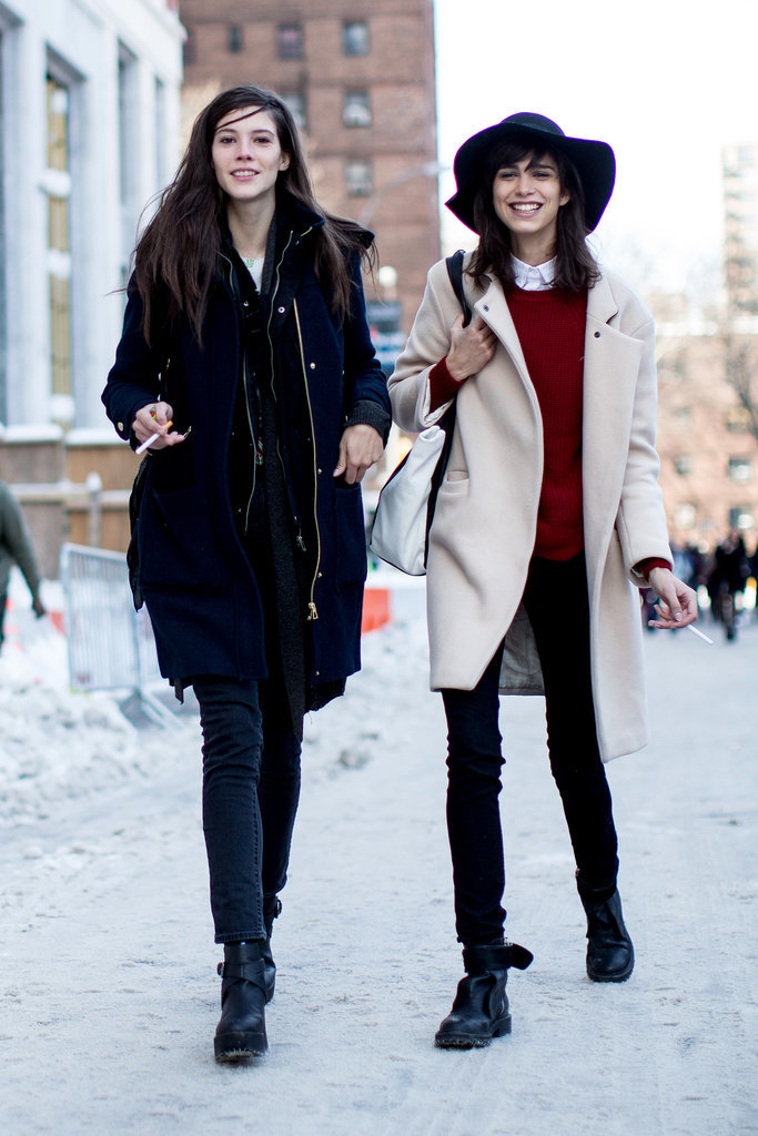 Models went marching two by two in understated outerwear. 
