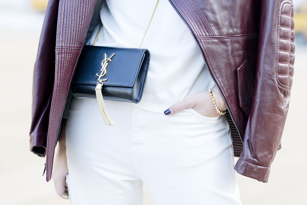 Delicate gold jewels and a dainty YSL bag were the perfect picks against Winter white and burgundy.
Source: Tim Regas
