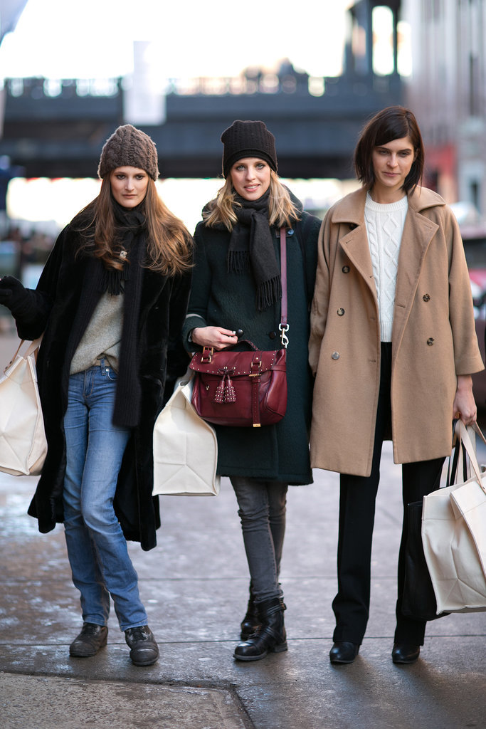 Three's a crowd, but three models make a very chic crowd.
