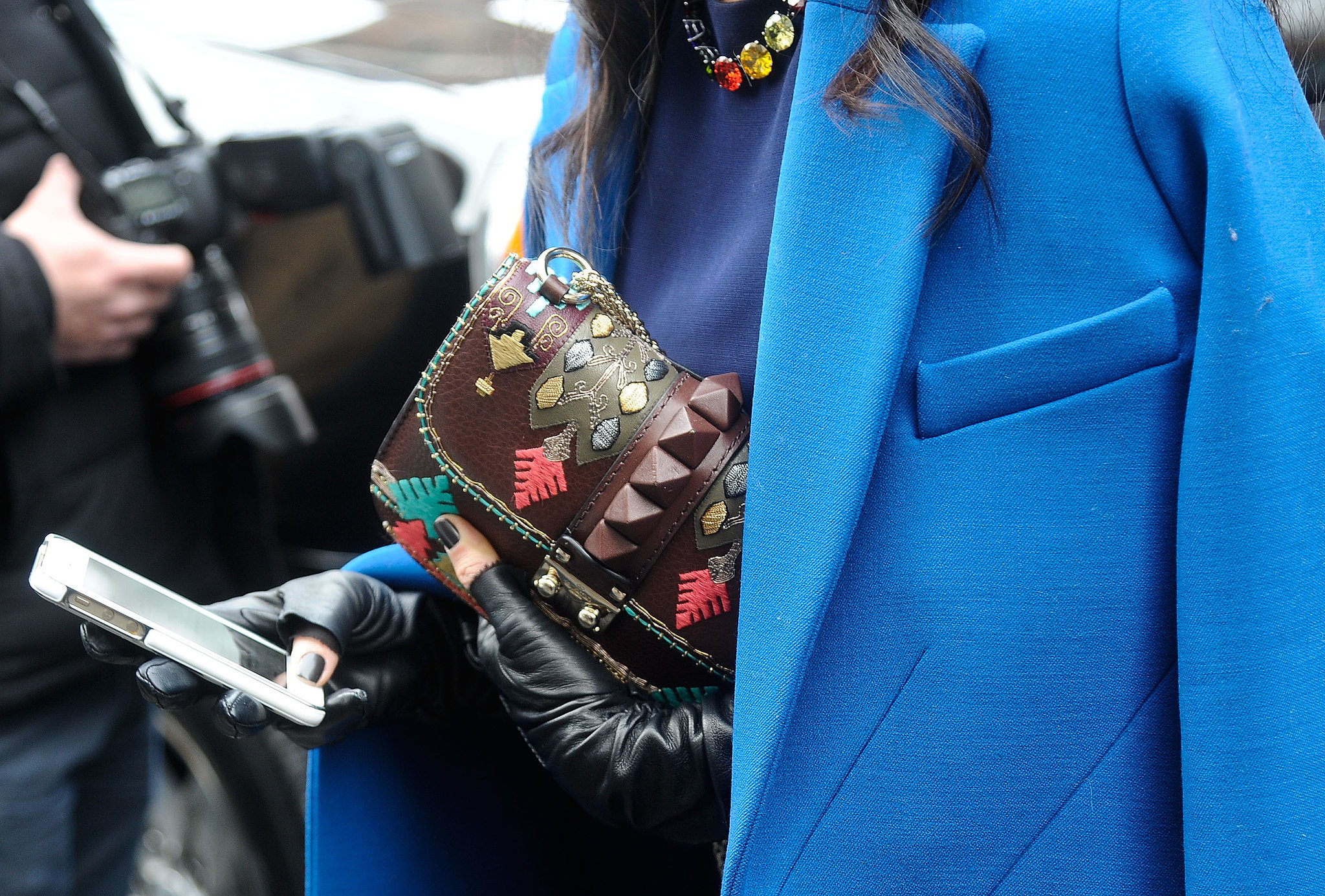 Her commitment to going bold and bright extended beyond just her outerwear. 
